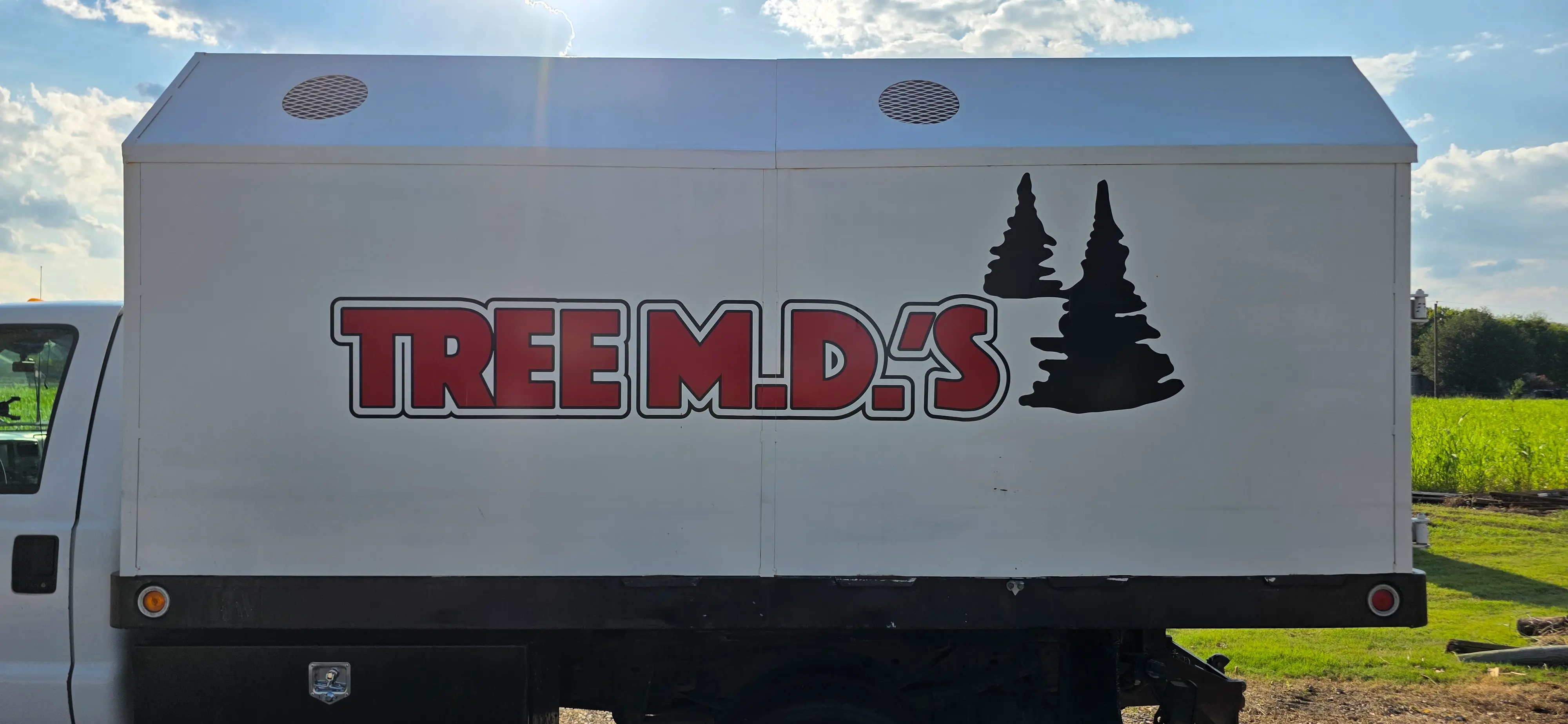 Tree MD's truck and equipment in the field